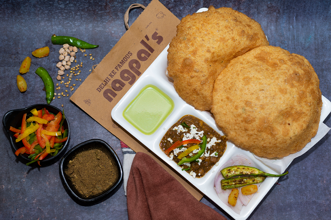 Delicious Chole Bhature - A quintessential North Indian dish known for its flavorful taste and crispy bhaturas served with spiced Channa masala